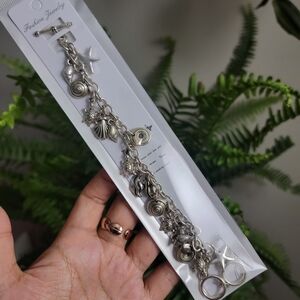 Charm Bracelet with Sea Motifs - Turtle, Sea Shells, Star Fish, & Fish